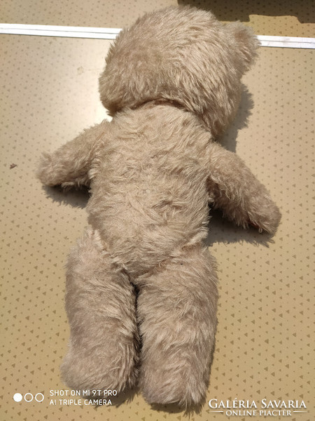 Antique crying teddy bear