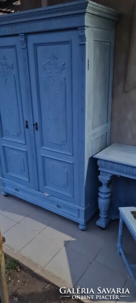 Antique table with chairs and matching cabinet painted blue