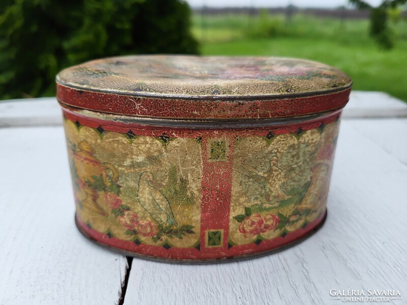 Antique tin box with birds and roses