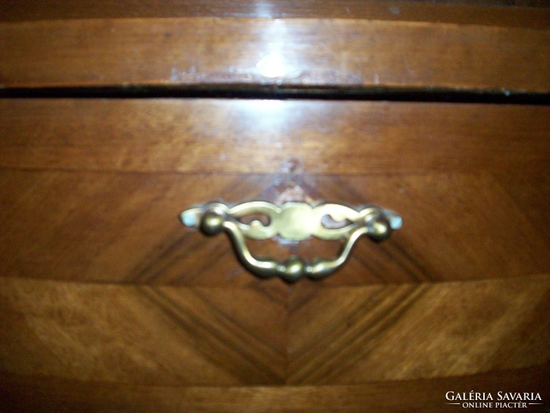 XX. An antique sideboard made at the beginning of the century