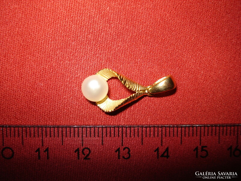 14K genuine saltwater pearl pendant.