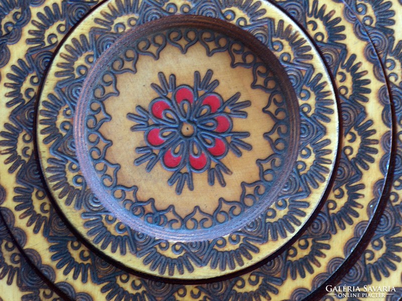 Five stackable painted wooden decorative plates, wall plate