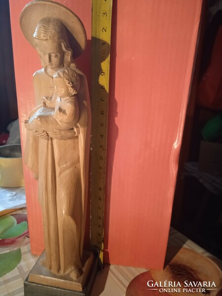 Mary with her child carved from wood