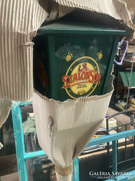 Advertising standing candelabra with beer