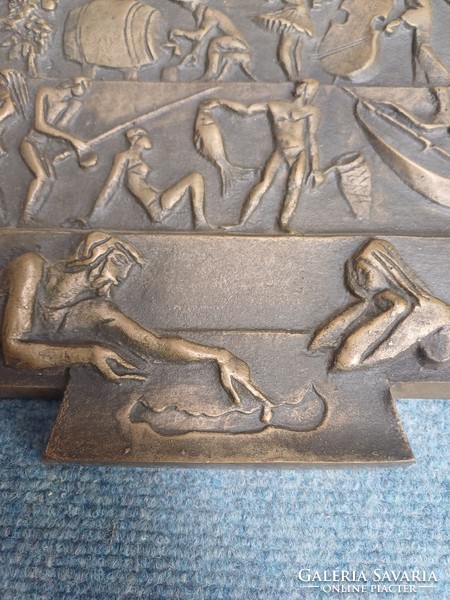 A rare balaton bronze relief, scene of danger creation