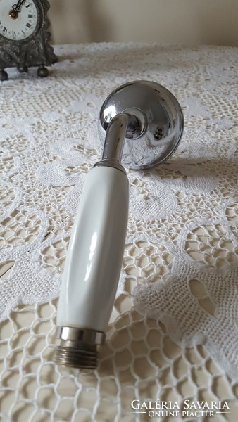 Old shower head with ceramic insert handle