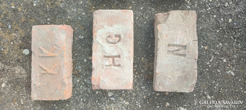 Stamped bricks are for sale.