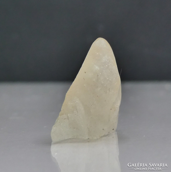 Libyan desert glass with cristobalite inclusions. A rare piece of natural impact tectite.
