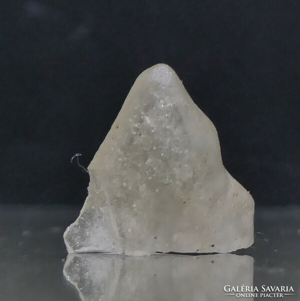 Libyan desert glass with cristobalite inclusions. A rare piece of natural impact tectite.