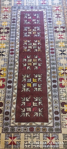 Antique hand-knotted Kazakh Persian rug