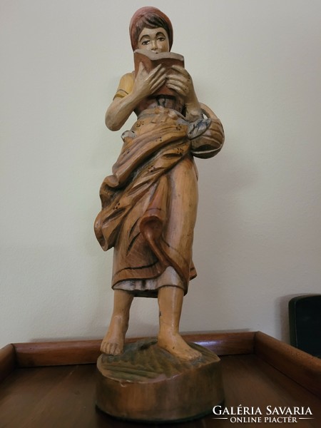 Antique old painted wooden statue
