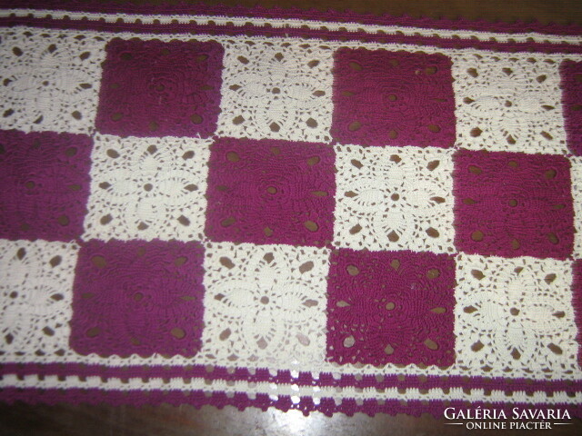Beautiful antique hand-crocheted white-purple tablecloth with flower pattern