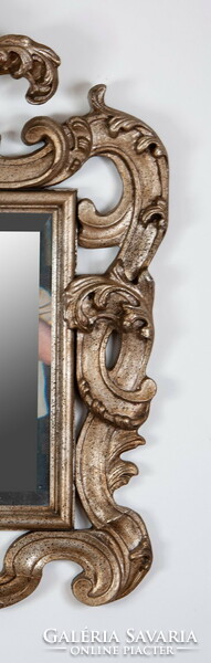 Carved wooden mirror with stylized tendril decor, silver color
