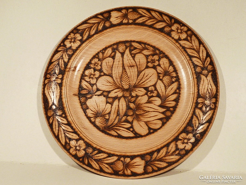 Wooden bowl with burnt decoration