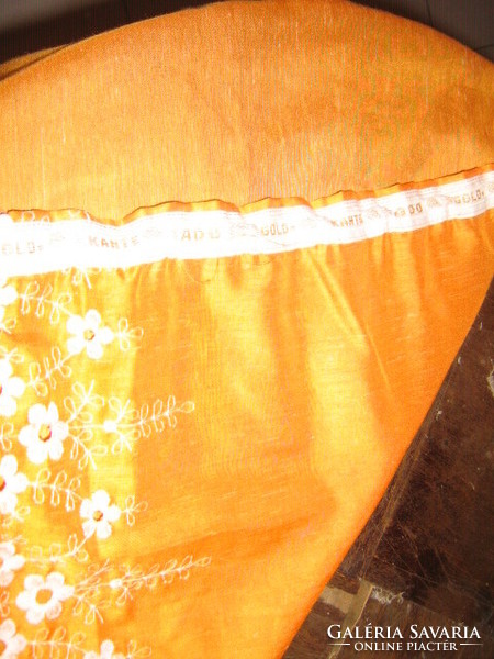 A pair of beautiful madeira embroidered special curtains with orange and white flowers