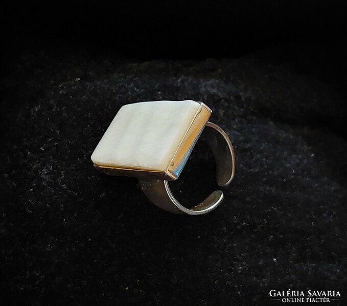 Modernist silver ring set with bone, adjustable size