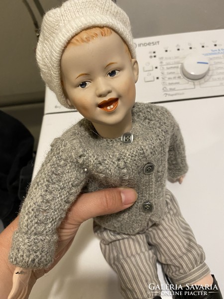 A beautiful articulated doll with a biscuit head