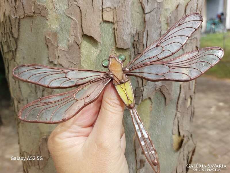 A unique glass dragonfly made using the Tiffany technique