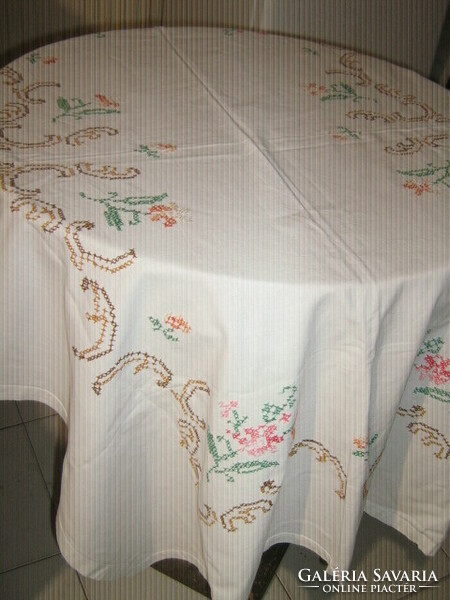 Beautiful floral tablecloth with cross-stitch embroidery