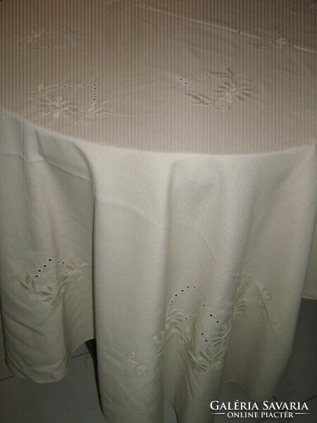 Beautiful hand-embroidered elegant cream-colored tablecloth
