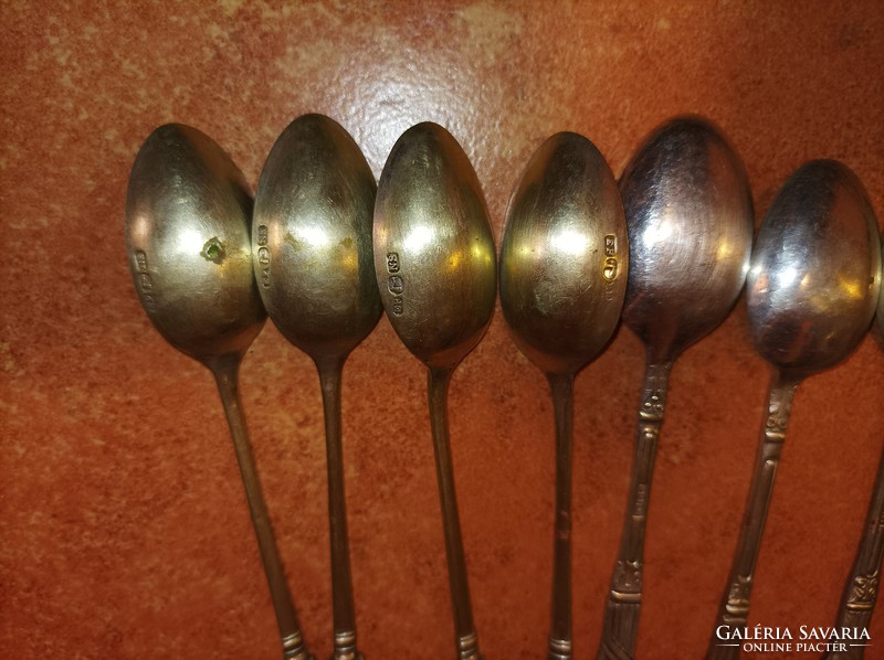 Spoon with 7 antique silver plated ornaments