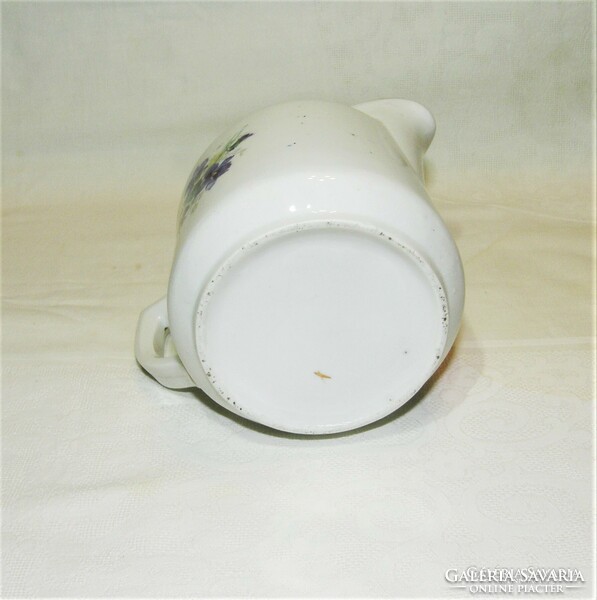 Porcelain spout with violet pattern