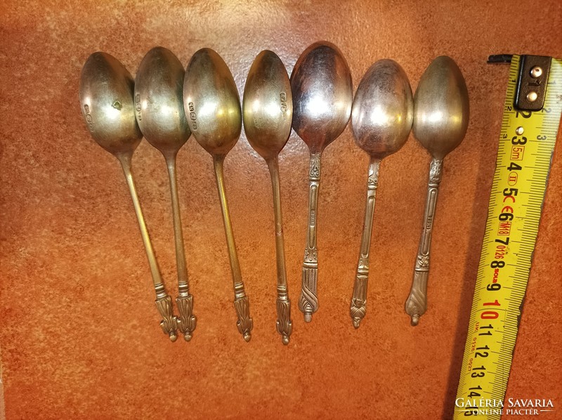 Spoon with 7 antique silver plated ornaments