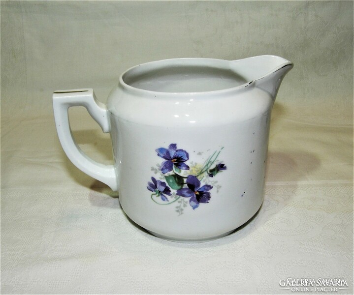 Porcelain spout with violet pattern