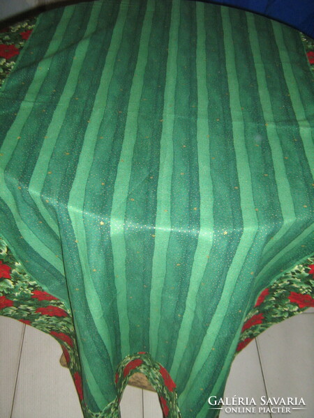 Beautiful vintage Christmas green background festive tablecloth runner with gold stars and floral edges