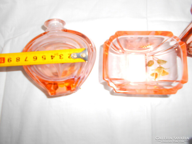 2 pink perfume bottles