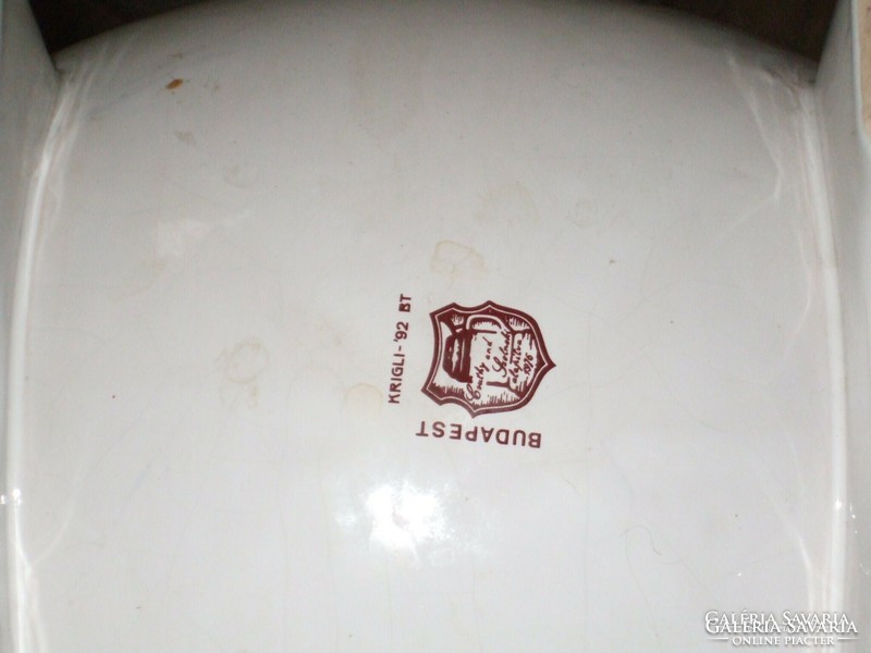 Large ceramic barrel with copper tap.