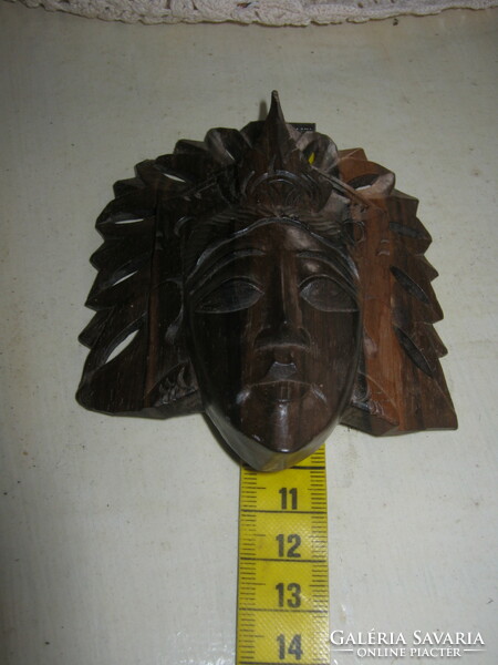 Carved wooden wall mask