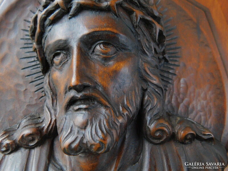 Wood carving, beautiful frame of Christ's head with a wreath of thorns, beautiful, flawless
