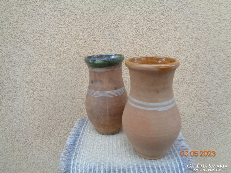 Old Obanya milk jugs, 19 cm, crack on one