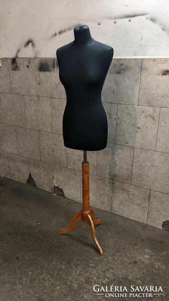 Mannequin on elegant wooden legs