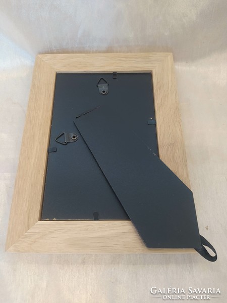 Wooden picture frame with glass