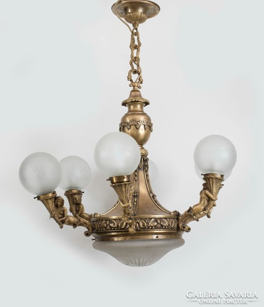 Gilded bronze chandelier with stylized mermaid arms