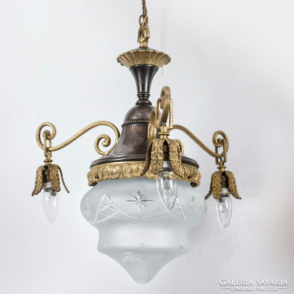 French dining room chandelier with gilded details
