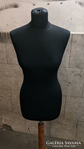 Mannequin on elegant wooden legs