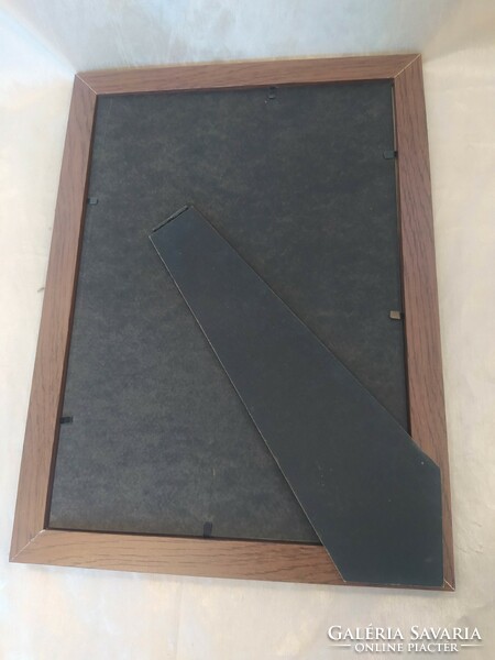 Wooden picture frame with glass