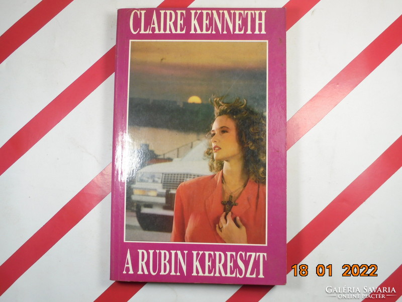 Claire Kenneth: A Rubin kereszt Vesztett játszma, A rubin kereszt, Femme fatale