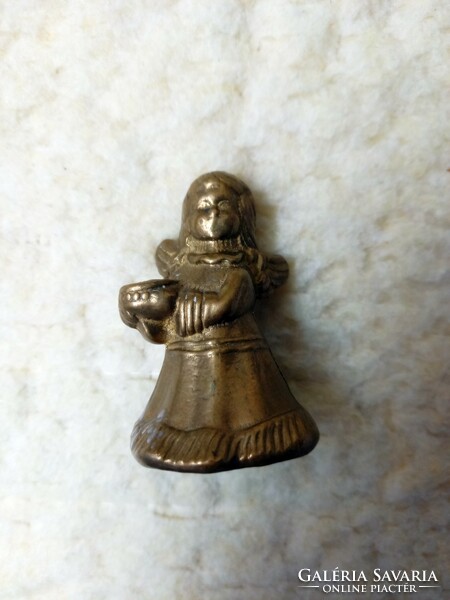 Angel shaped brass candle holder