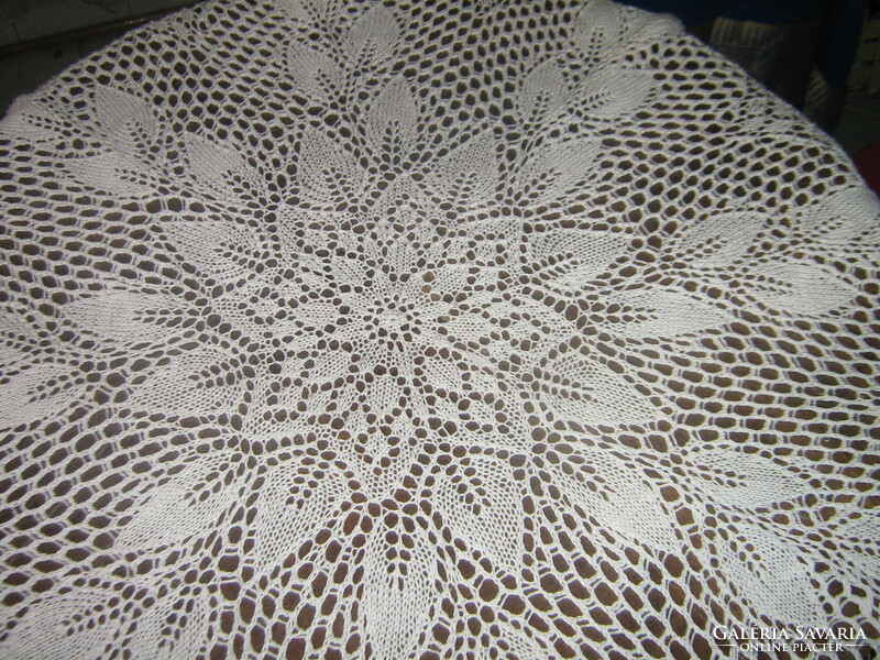Beautiful crocheted antique white round lace tablecloth