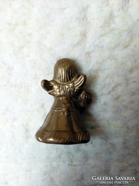 Angel shaped brass candle holder