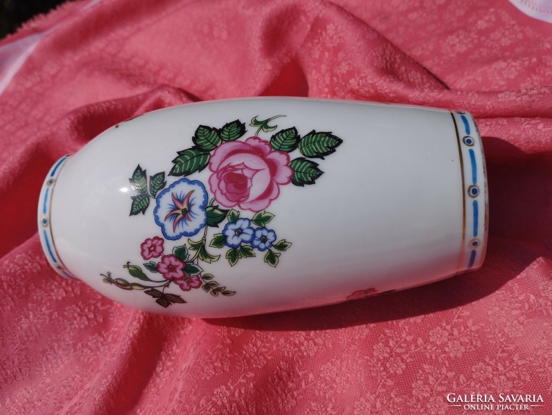 Beautiful porcelain vase with a rose pattern