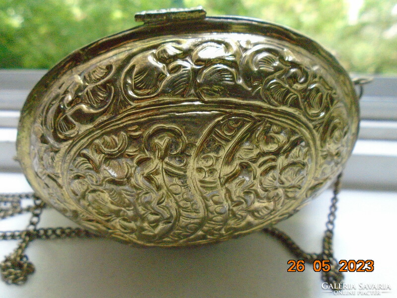 Eastern gilded copper lidded talisman with embossed and punched relief patterns, with a chain