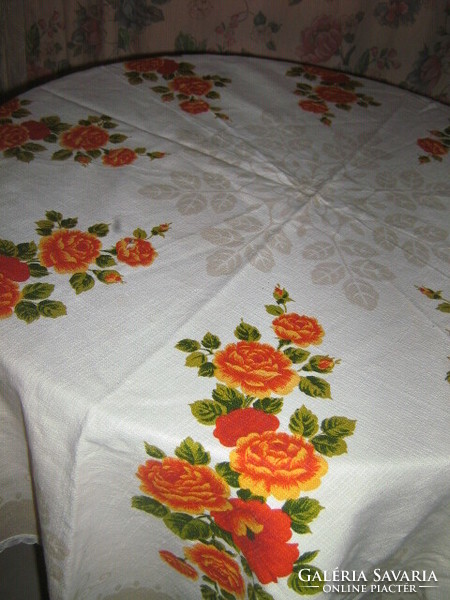 Beautiful vintage-style round tablecloth with floral edges