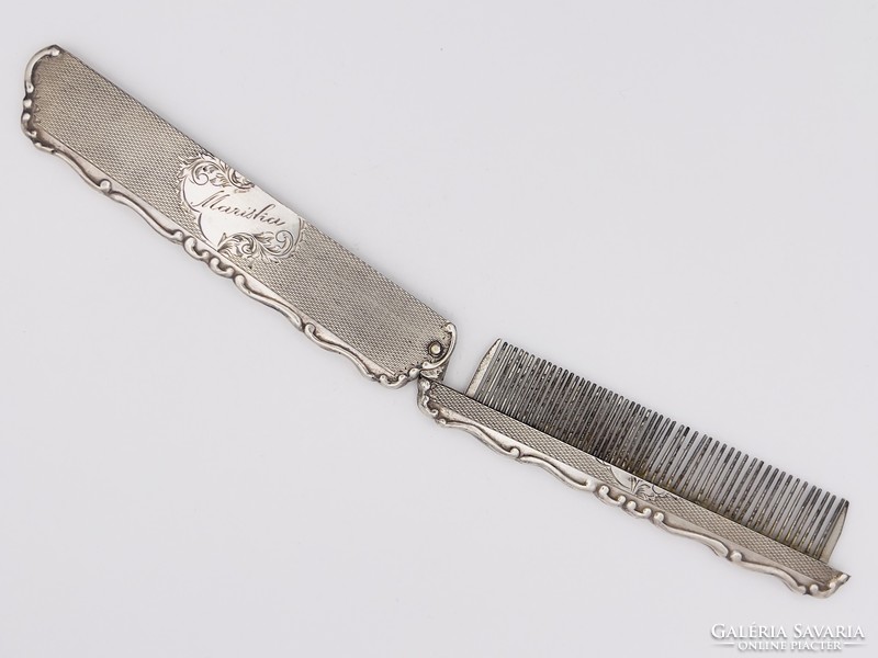 Antique silver comb from the turn of the century, complete