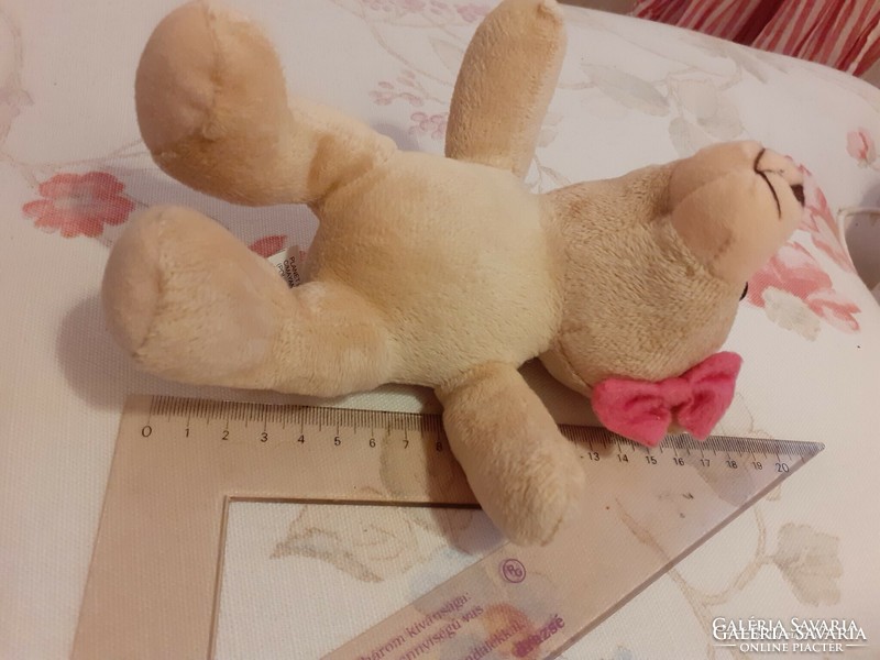 Teddy bear - small plush teddy bear with a pink bow