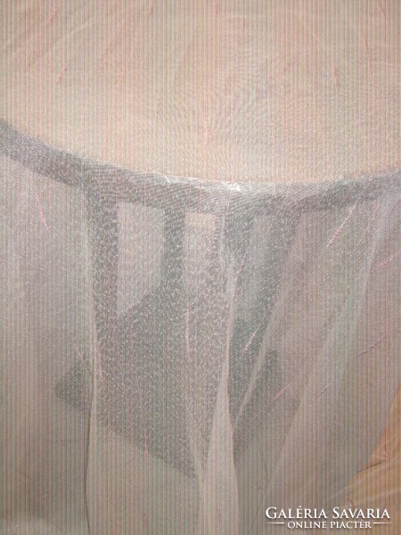 A special curtain woven with beautiful pink silvery thread